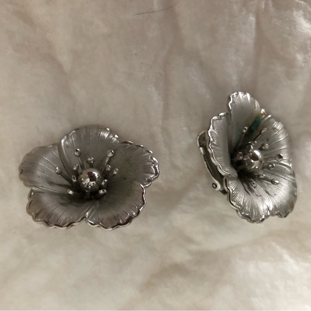 silver tone flower clip on earrings